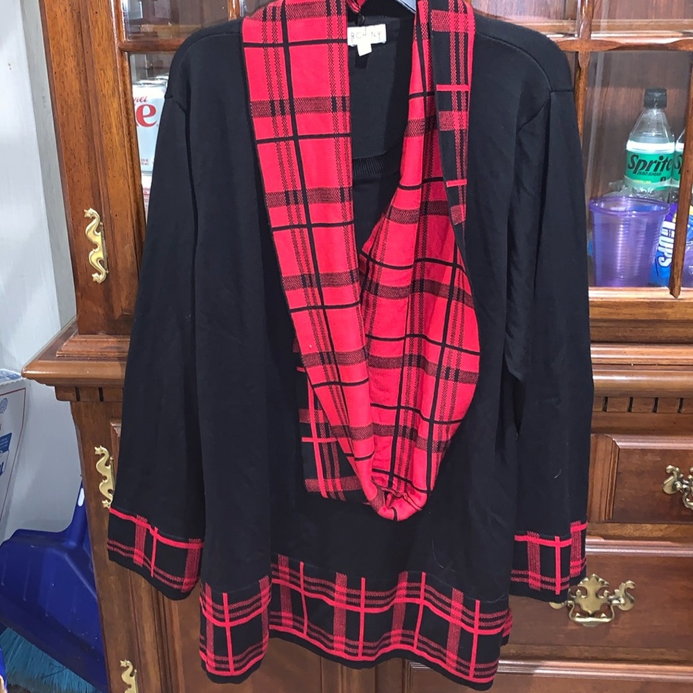 Black sweater with red an black design. Birch NY brand